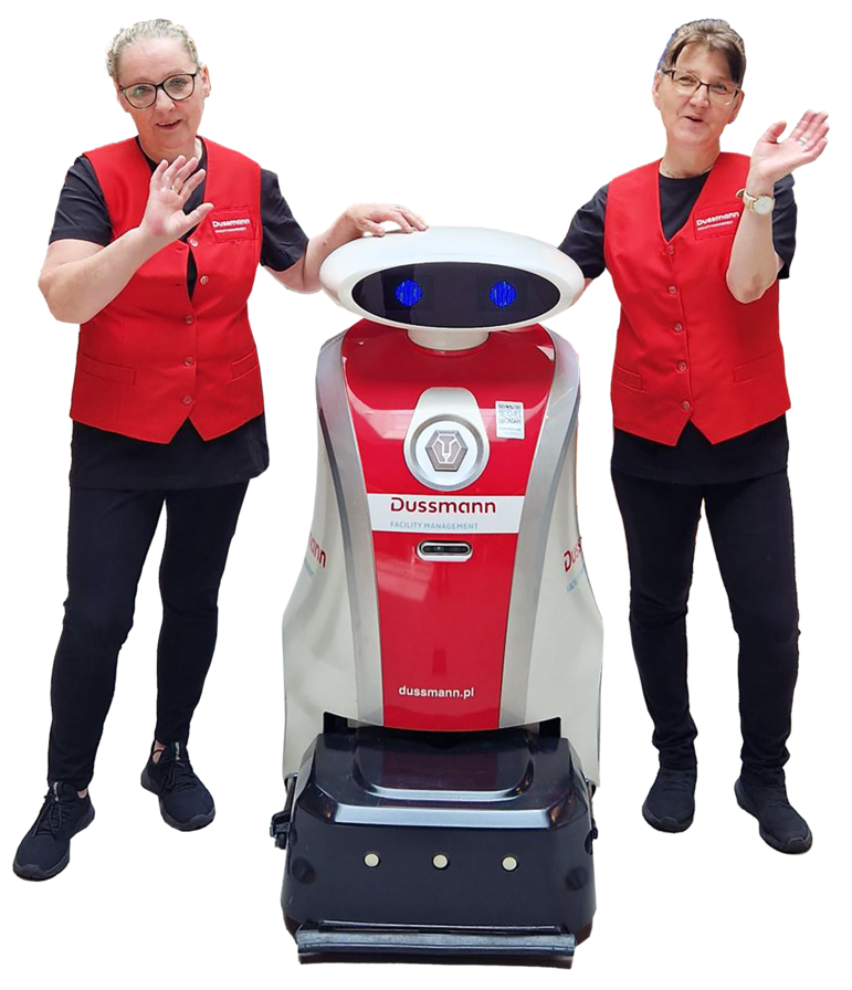  Workers standing with a robot
